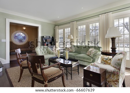 Living room in luxury home with foyer view