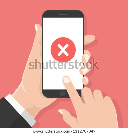 Flat design style human hand  holding smartphone or tablet with Red cross mark on the screen , vector design element illustration