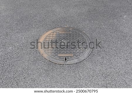 Similar – Image, Stock Photo round manhole cover on rain wet road