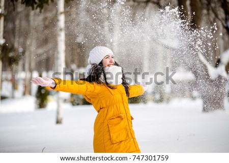 Similar – Image, Stock Photo young woman throws snow in the air