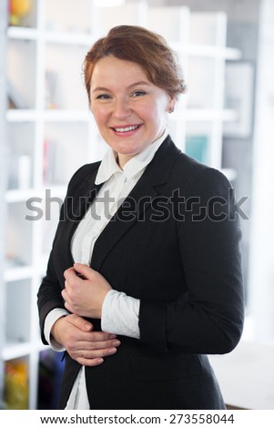Portrait of white collar worker in office