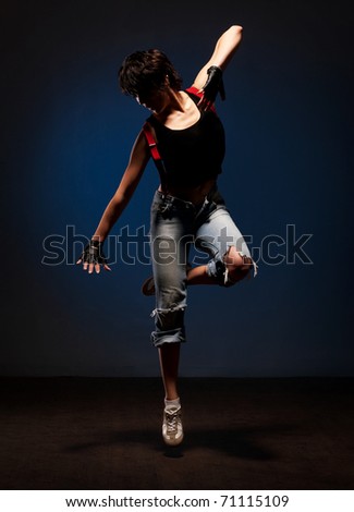 Portrait of woman dancing in street style