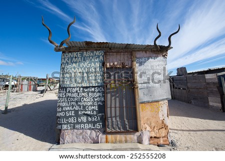 Khayelitsha, Cape Town - September 29,2013: Witchdoctor\'s shack in township claims traditional healing powers.