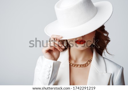 Similar – Image, Stock Photo Long haired woman hiding under green cloth