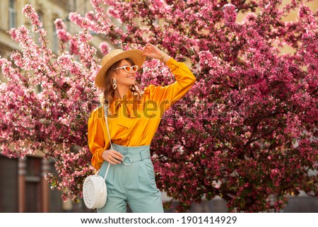 Similar – Image, Stock Photo Smiling woman in blooming field