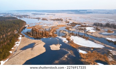 Similar – Foto Bild Frühling Schmelzen Fluss Überschwemmung Luftbild-Panorama. Überlaufwasser im Frühling