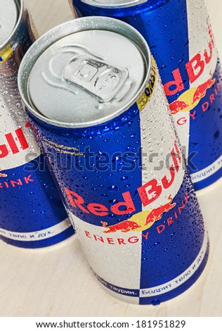 Moscow, Russia - FEBRUARY 27, 2014: Red Bull is an energy drink sold by Austrian company Red Bull GmbH, created in 1987.Very popular energy drink in Russia
