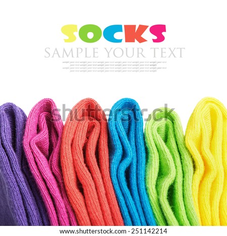 colorful socks isolated on white background. text serves as a model and can be easily removed in the editor.