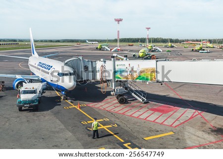 Moscow, Russia - June 4, 2014: Service aircraft before flight at Domodedovo airport. Domodedovo International Airport, one of the three major airports in Moscow and Moscow region.