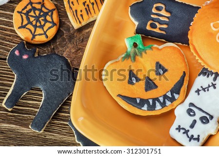 happy Halloween homemade cookies. Focus on the pumpkin cookies