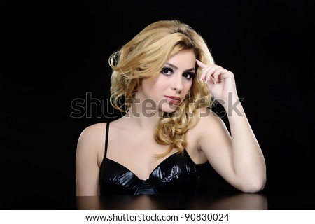 fashion woman on black background posing