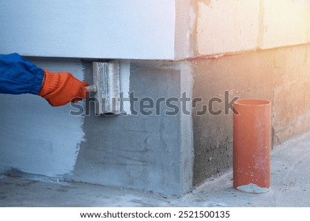 Similar – Image, Stock Photo painter working with paint roller to paint the wall of a room. do it yourself concept image