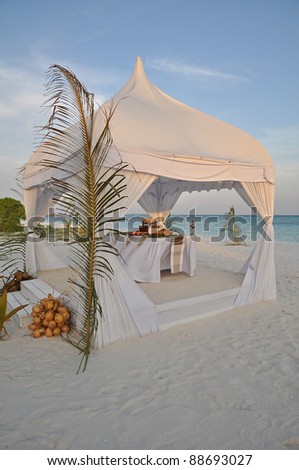 Wedding tent in the maldives at sunset