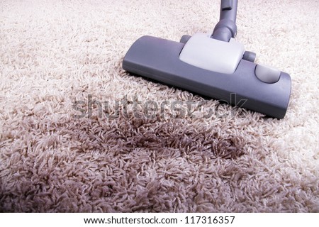 vacuuming very dirty carpet
