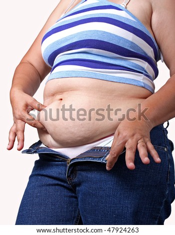 fat asian woman checking her belly fat
