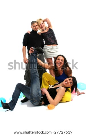 Full body view of three woman and a man in casual wear, posing all together for a picture. Isolated on white background.
