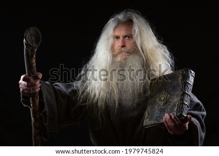 Similar – Image, Stock Photo Old man with long grey hair