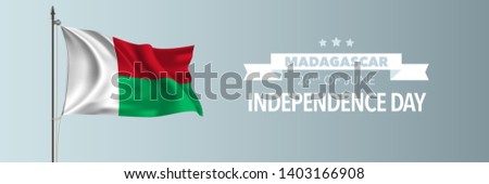 Madagascar happy independence day greeting card, banner vector illustration. Malagasy national holiday 26th of June design element with waving flag on flagpole 