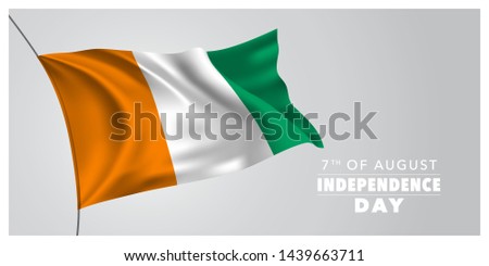 Cote Divoire happy independence day greeting card, banner, horizontal vector illustration. Cote D’Ivoire holiday 7th of August design element with waving flag as a symbol of independence 