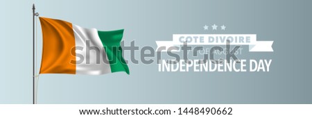 Cote Divoire happy independence day greeting card, banner vector illustration. Cote D’Ivoire national holiday 7th of August design element with waving flag on flagpole 