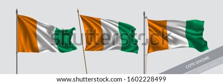 Set of Cote D'Ivoire waving flag on isolated background vector illustration. 3 Cote Divoire wavy realistic flag as a symbol of patriotism 