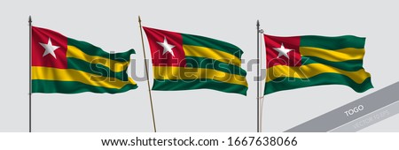 Set of Togo waving flag on isolated background vector illustration. 3 Togolese wavy realistic flag as a symbol of patriotism