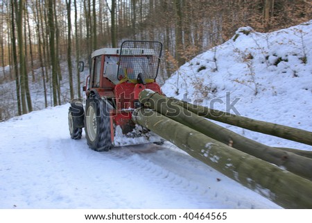 Tractor grows wood distribution line