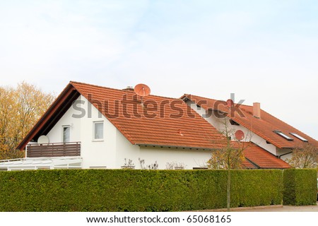 House behind hedges