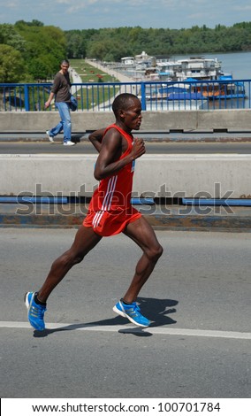 BELGRADE, SERBIA - APRIL 22:  An unidentified man runs in 25th Belgrade Marathon on April 22, 2012 in Belgrade, Serbia