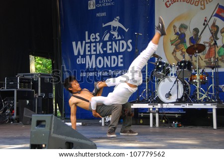 MONTREAL CANADA JULY 15: Cambodian acrobats in action a the Montreal's Week-ends du monde presented at Parc Jean-Drapeau. On july 15 2012 in Montreal Canada