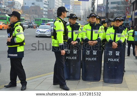 SEOUL SOUTH KOREA APRIL 6: Seoul riot police during protestation again redundancy people by a company on april 6 2013 in Seoul South Korea