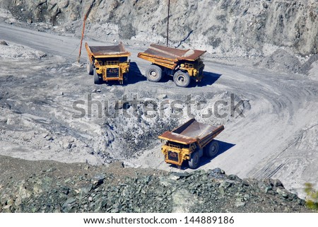 ASBESTOS - CANADA AUG. 23: Operation by workers in bottom of asbestos mine on Aug, 23 2010.The inhalation of asbestos fibers can cause serious illnesses, including malignant lung cancer.