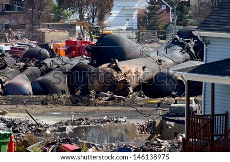 LAC MEGANTIC CANADA JULY 14: Tankers exploded after the wost train disaster in the canadian history on july 14 2013 in Lac Megantic Canada. 50 people was killed in this  humanitarian disaster.