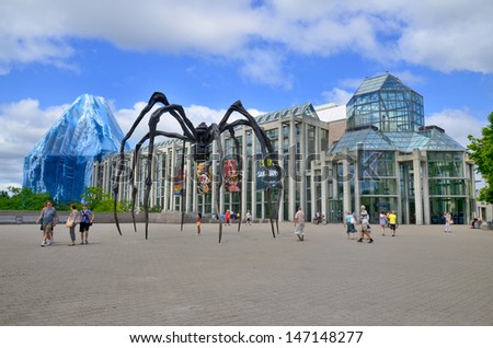 OTTAWA CANADA JUNE 30: Spider sculpture in front the National Gallery of Canada, located in the capital city Ottawa, Ontario, is one of Canada\'s premier art galleries. On june 30 2013 in Ottawa Canada