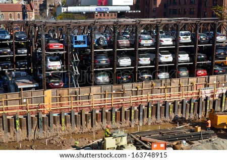 NEW YORK, USA OCTOBER 28: An automated car parking system on October 28, 2013 in Manhattan, New York City, USA. Automatic multi-story automated car park systems are less expensive per parking slot.