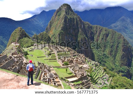 MACHU PICCHU NOVEMBER 24: Tourists walk in Machu Picchu site on November 24 2010 in Machu Picchu. Machu Picchu is a 15th-century Inca site located 2,430 metres (7,970 ft) above sea level