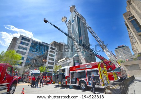 MONTREAL CANADA MAY 18: Fire engine on may 18 2014 in Montreal Canada. Service de securite incendie de Montreal the SIM is the 7th largest fire department in North America.