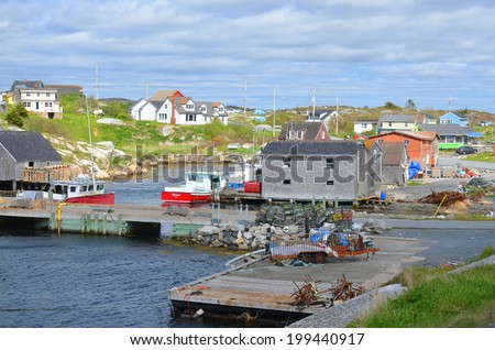 PEGGY\'S COVE NOVA SCOTIA JUNE 6: Typical fisherman houses in Peggy\'s Cove a small rural community located on the eastern shore of St. Margarets Bay in Nova Scotia on june 6 2014.