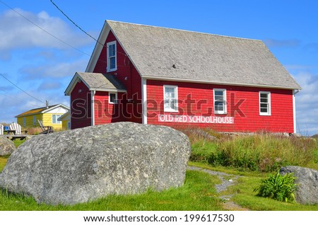 PEGGY\'S COVE NOVA SCOTIA JUNE 6: Typical fisherman school in Peggy\'s Cove a small rural community located on the eastern shore of St. Margarets Bay in Nova Scotia on june 6 2014.