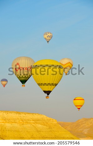 GOREME, TURKEY - OCTOBER, 02: Hot air balloon fly over Cappadocia is known around the world as one of the best places to fly with hot air balloons on october 02, 2013 in Goreme, Cappadocia, Turkey.
