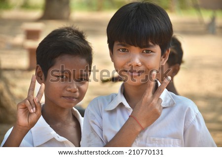PHNOM PHEN, CAMBODIA MARCH 23: Unidentified student children posing on march 23 2013 in Phnom Phen,Cambodia. Thousands of the rural poor in Cambodia struggle to meet their basic needs due to poverty.