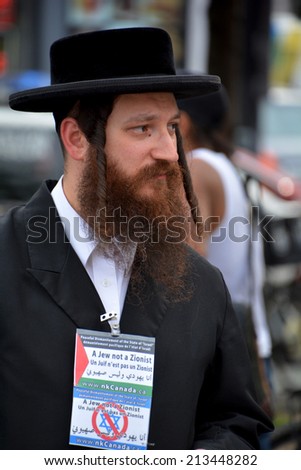 MONTREAL CANADA AUGUST 21:Unidentified people form jewish Hasidic Orthodox Judaism, participating in a rally to condemn the Israel occupation an bombing on Gaza On 08 21 2014 in Montreal Quebec Canada