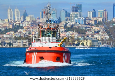 ISTANBUL TURKEY SEPTEMBER 29: Tug boat on Bosfore sea on september 29 2013 in Istanbul Turkey. The population of Istanbul was 13,85 millions (2012)