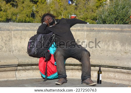 PARIS FRANCE OCTOBER 18: Homeless man in the heart of downtown Paris on october 18 2014. A homeless person dies \'every 20 hours\' in France