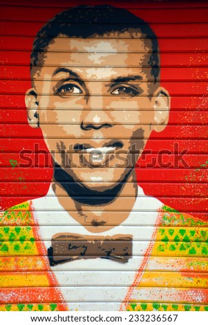 PARIS FRANCE OCT 19: Street art belge singer Stromae  in Paris France oct 19 2014. Paris is the perfect place to walk in the back alleys and abandoned areas, looking for fresh air and street art.