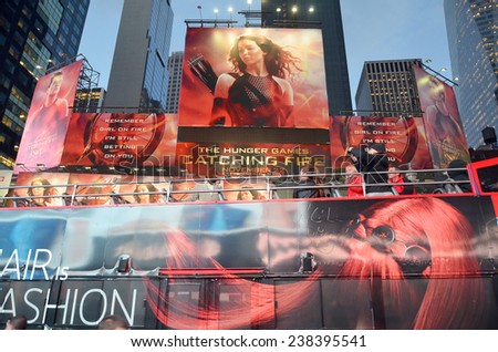 NEW YORK USA OCTOBER 27: Giant sign of The Hunger Games: Catching Fire movie in Time Square on October 27, 2013 in New York, Catching Fire, the second installment in The Hunger Games trilogy