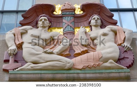 NEW YORK USA OCTOBER 27: The polychrome limestone Art Deco bas-relief sculpture,  Progress, is located above the north, 49th Street,   faÃ?Â§ade  of 1 Rockefeller Center. on October 27, 2013 in New York