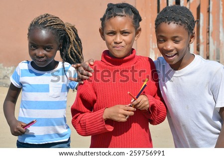 SWAKOPMUND, NAMIBIA OCTOBER 09, 2014: Unidentified children living in Mondesa slum of Swakopmund on october 09 2014. In Namibia About 27.6 per cent of households are classified as poor.
