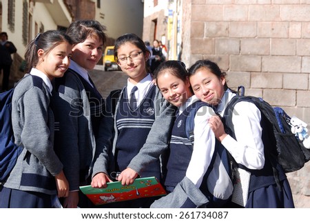 CUSCO PERU-NOV. 25:  Unidentified School girls posing for portrait on Nov. 25 2010 in Cusco Peru. One-third of girls in rural Peru never finish primary school.