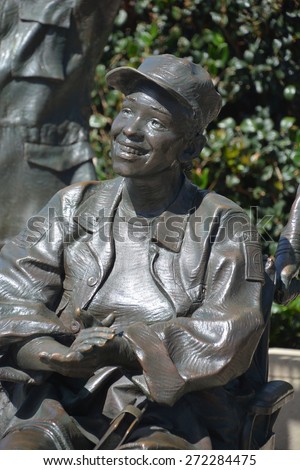 SAN DIEGO CA USA APRIL 8 2015: Detail of the bronze statues of A National Salute to Bob Hope and the Military. On the plaza, there are 15 bronze statues, arranged as if attending a Bob Hope show.